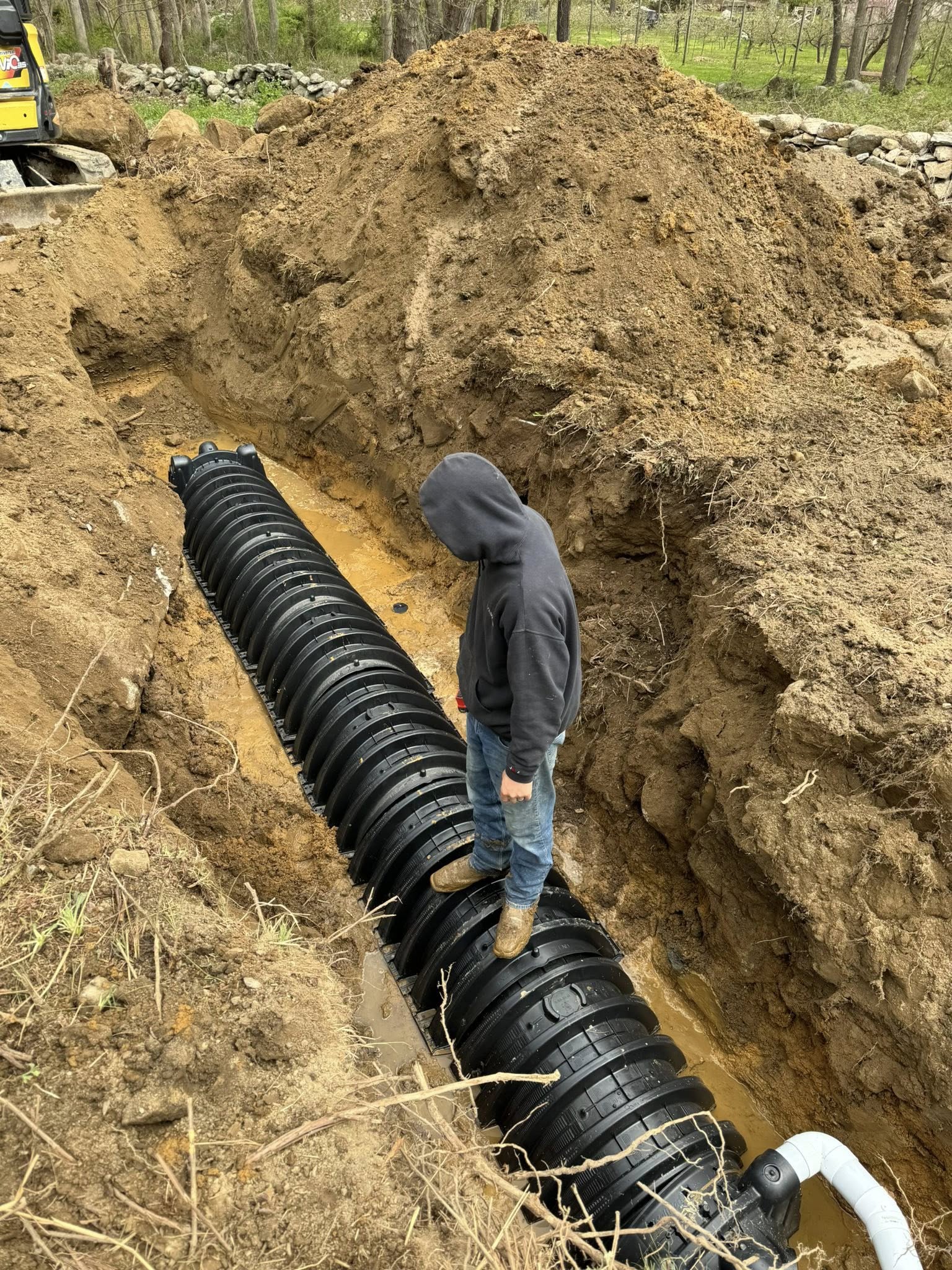 Sparkle Lake crew working a drainage install